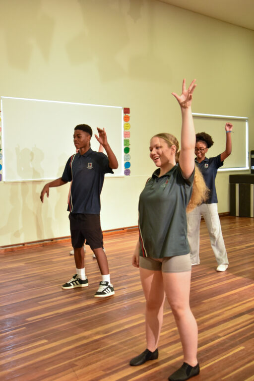 Students and a teacher during a dance class in the studio