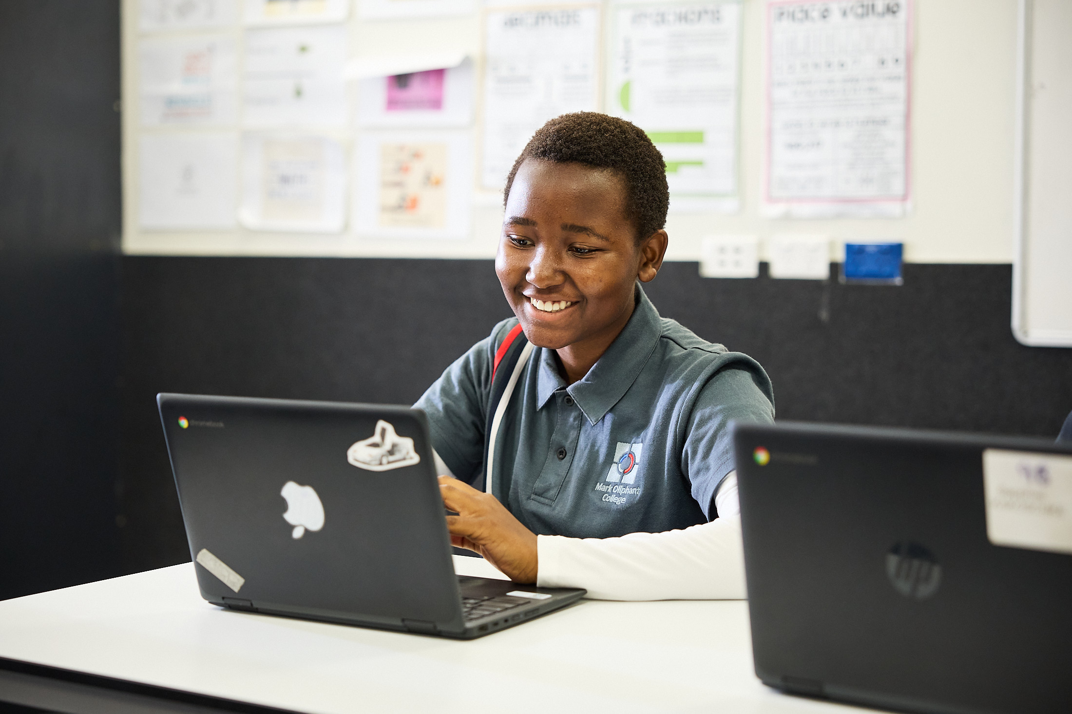 Student working on a laptop in the classroom