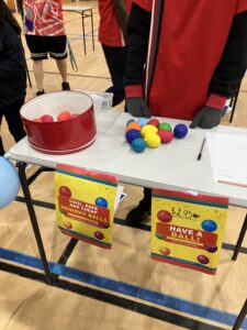 Student-run ball toss game stall at Year 6 Enterprise Day