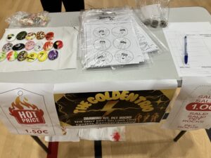 Student stall selling painted pet rocks and drawing kits at Year 6 Enterprise Day
