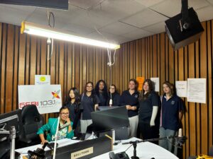 Year 9 Indonesian students standing in the 5EBI 103.1 FM studio