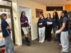 Year 9 Indonesian students touring the radio station with staff