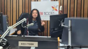Year 9 student at the 5EBI 103.1 FM studio desk