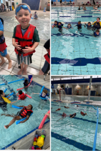 Students wearing life jackets during a school aquatics lesson at the pool